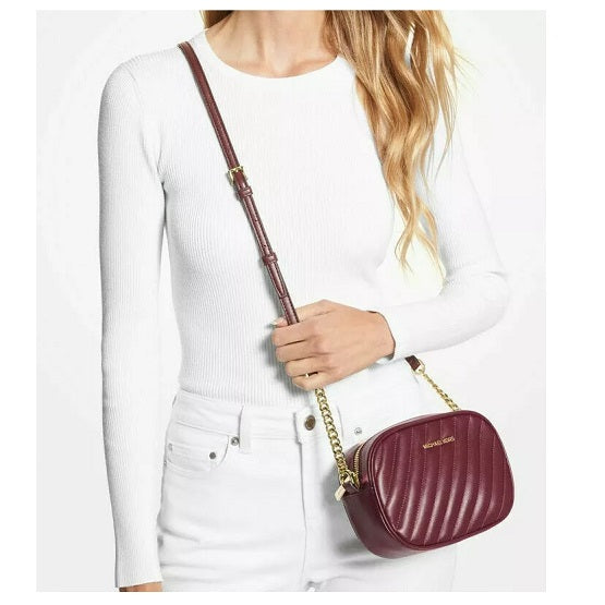 MICHAEL KORS - ROSE Small Quilted Oval Camera X-body In MERLOT Vegan Faux Leather ( damaged bag )